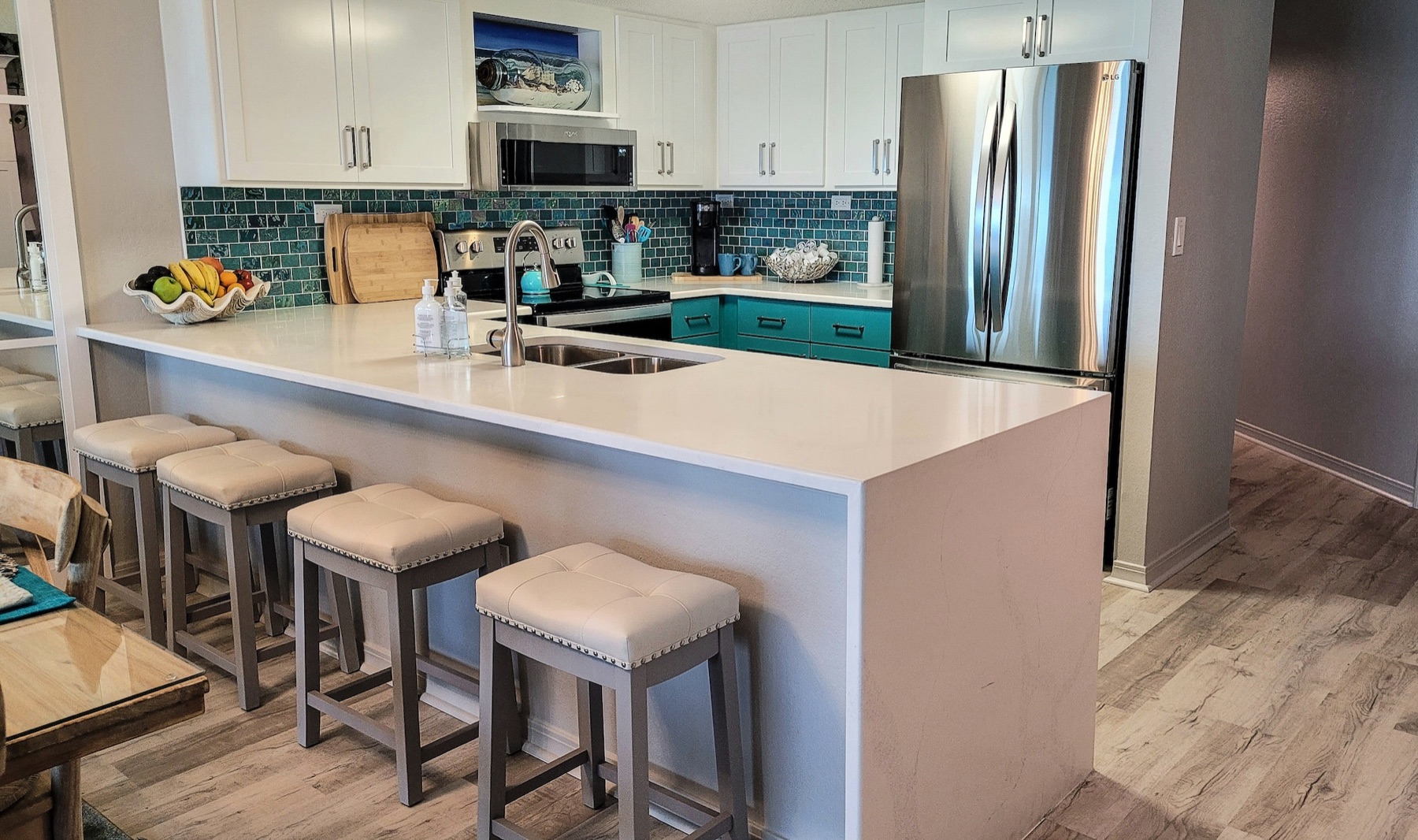 A remodeled kitchen with island seating