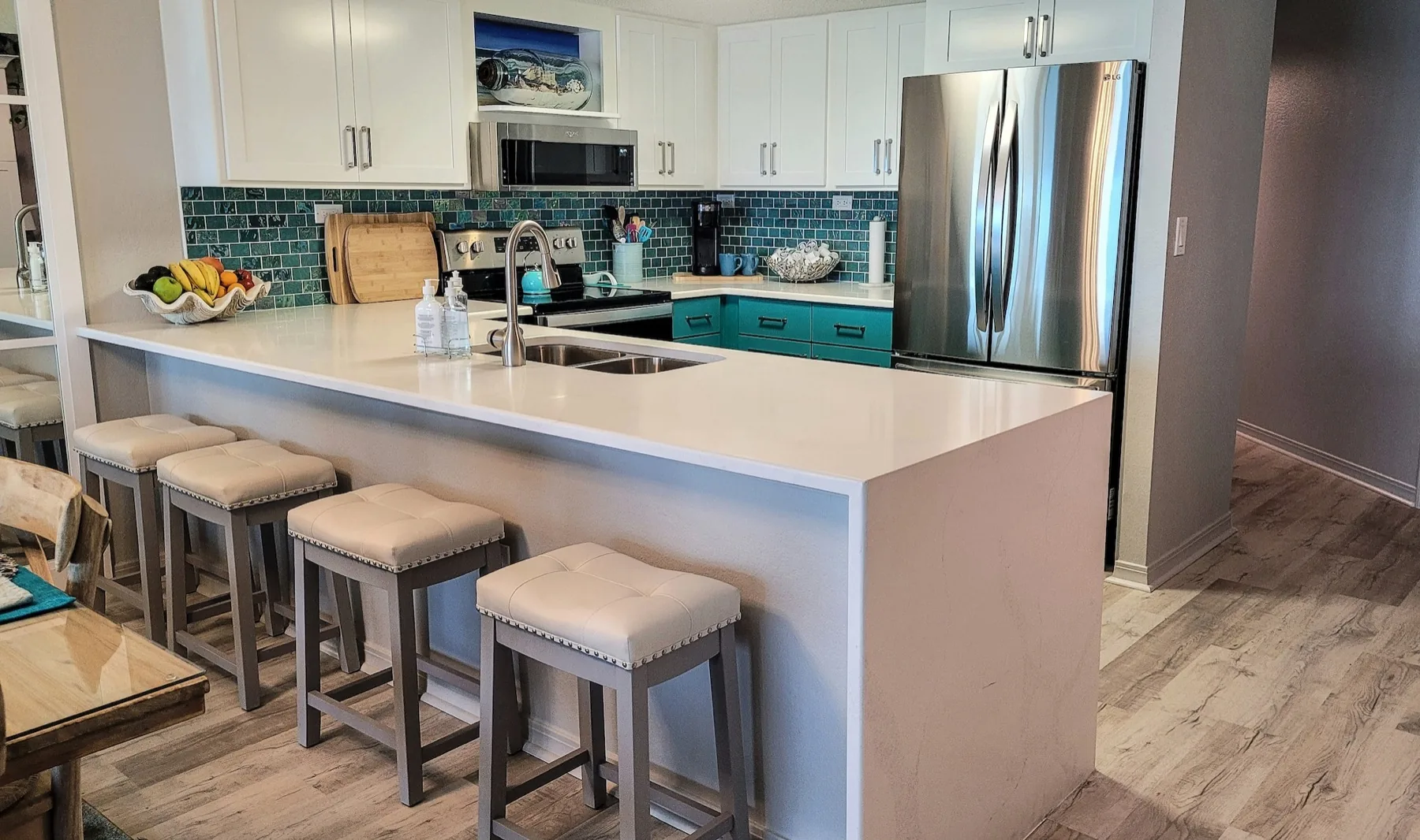 A remodeled kitchen with island seating